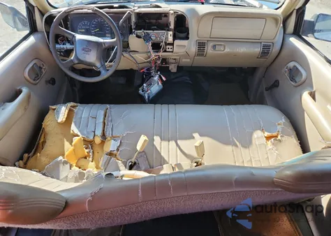 1999 Chevrolet Suburban C1500 из США, поврежденный, VIN 3GNEC16R1XG264785